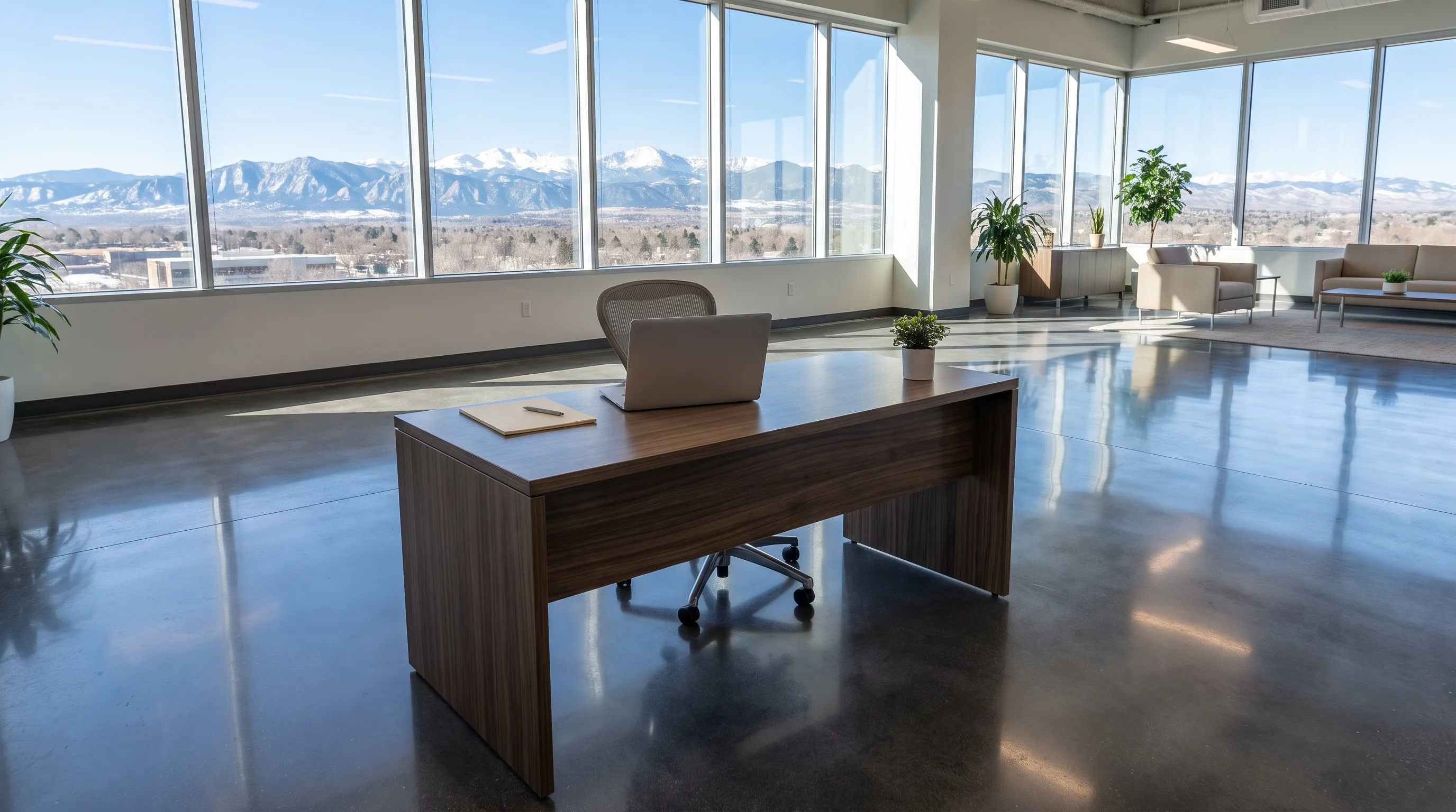 Modern Denver Colorado office space with glossy polished concrete epoxy floor and mountain view