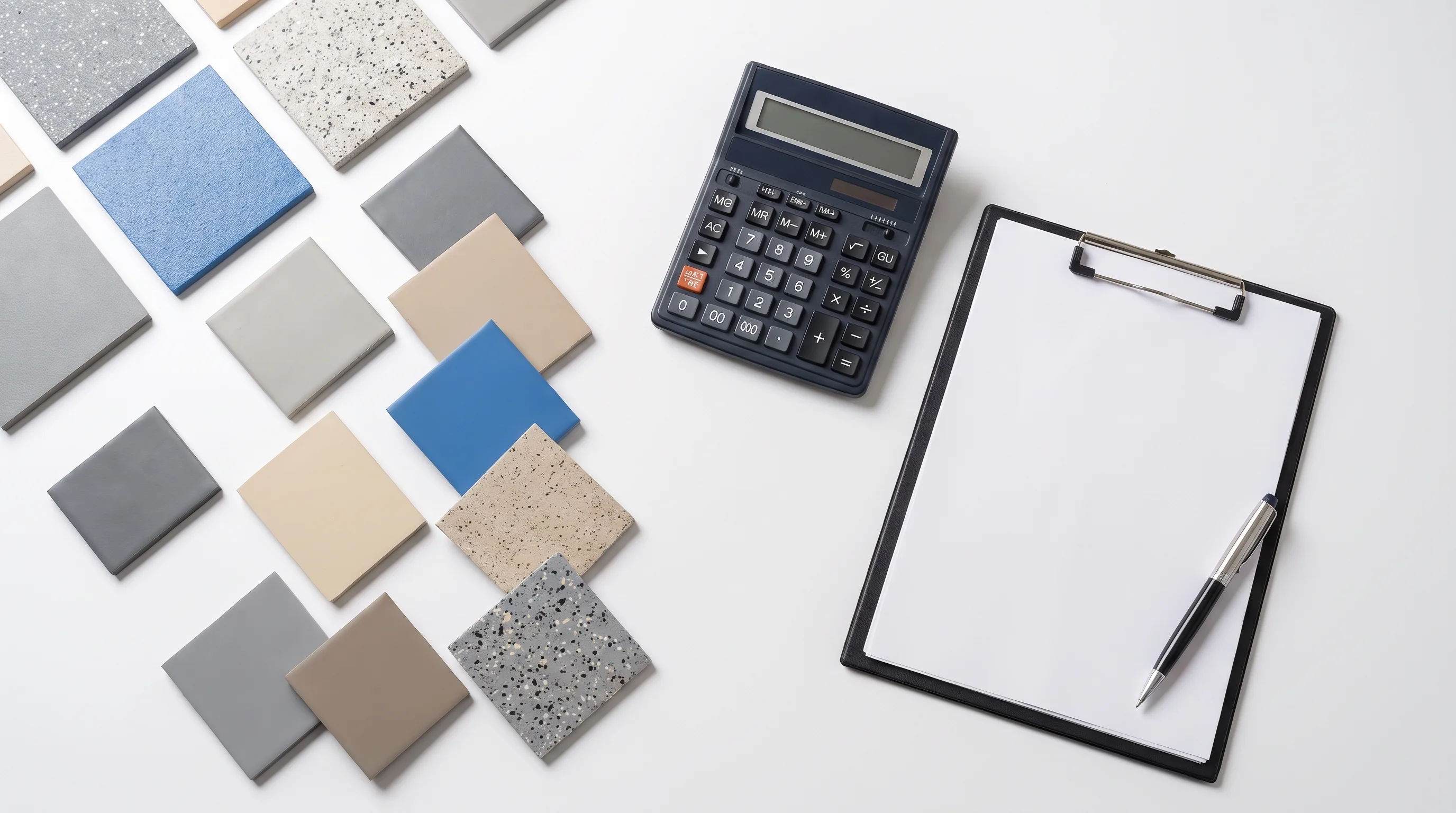 Flat lay of polyurea floor coating sample panels with calculator and clipboard